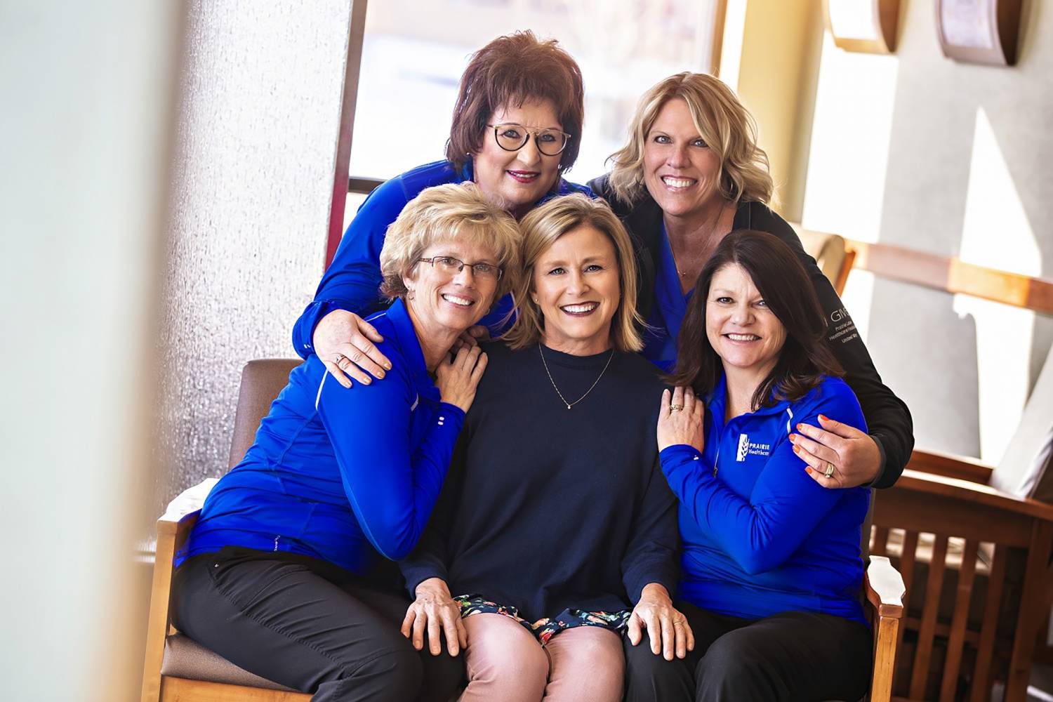 Current day Mary with a few members of her Cancer Center care team